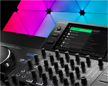 Numark Mixstream Pro DJ controller in a home studio in front of Nanoleaf Shapes RGB light panels. The perfect smart lights for parties or live streams.